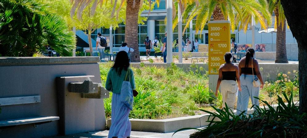 student walking on campus