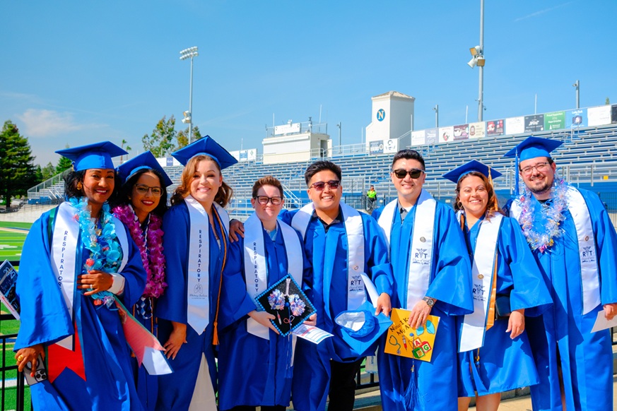 student in graduation outfits